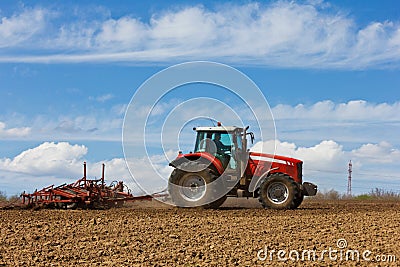 Tractor and Plow Stock Photo