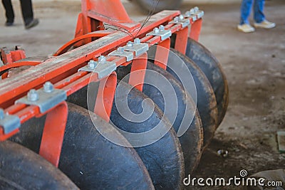 tractor plow plough for working in field Stock Photo