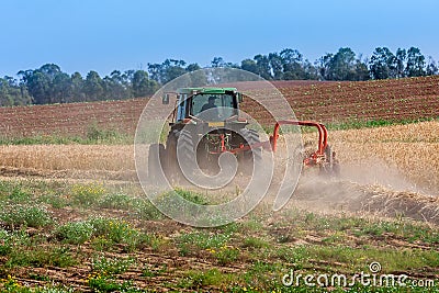 Tractor plow the soil. Stock Photo