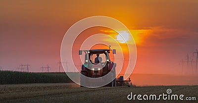 Tractor plowing Stock Photo