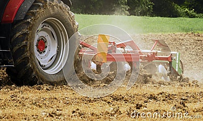 Tractor plowing Stock Photo