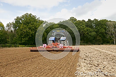 Tractor With Power Harrow Stock Photo