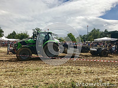 Tractor pulling heavy weight Editorial Stock Photo