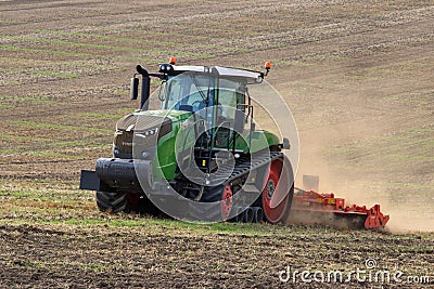 Tractor pulling a Ridged Roller - Yorkshire - England Editorial Stock Photo