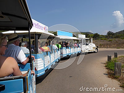 Tractor road train full of tourists Editorial Stock Photo