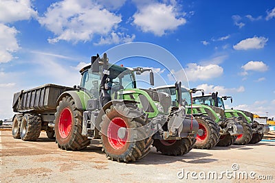 Tractor, standing in a row Stock Photo