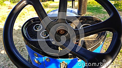 Tractor steering wheel and dashboard Stock Photo