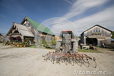 Tractor tiller farm center Stock Photo