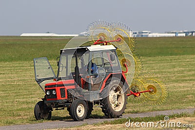 Tractor to mow grass Stock Photo