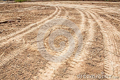 Tractor tyre tracks on the ground Stock Photo