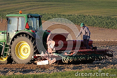 Tractor working on the field Editorial Stock Photo