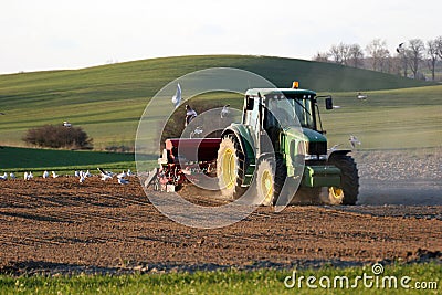 Tractor working on the field Editorial Stock Photo