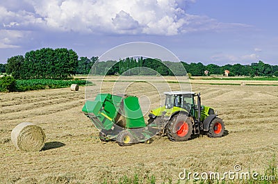 Tractors and harvesting Stock Photo