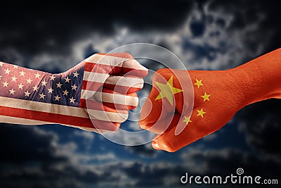 Trade conflict, fists with the flags of USA and China against ea Stock Photo