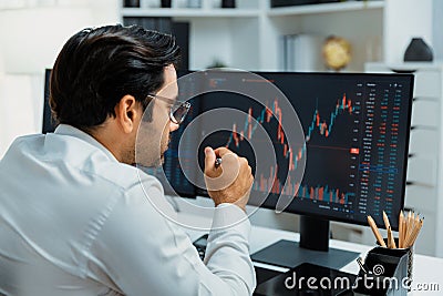 Trader analyzing in dynamic stock exchange investment screen on pc. Surmise. Stock Photo