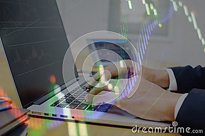 Trader analyzing trend line and trading charts and indicator Stock Photo