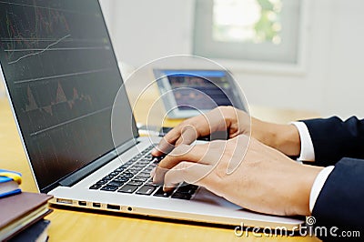 Trader analyzing trend line and trading charts and indicator Stock Photo