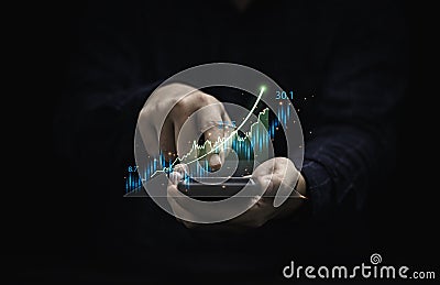 Trader holding smartphone and touching to technical graph chart for analysis stock market data and speculator investment concept Stock Photo