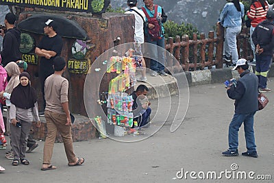 traders of various children's toys around Bandung tourist attractions in the morning Editorial Stock Photo