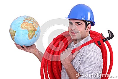 Tradesman holding a globe Stock Photo