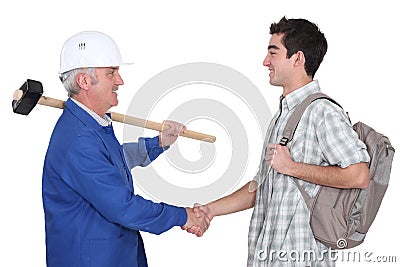 Tradesman meeting new apprentice Stock Photo