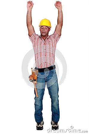 Tradesman stretching Stock Photo