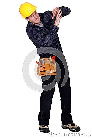 Tradesman with toolbelt Stock Photo