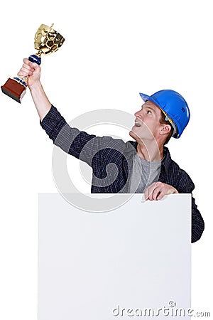 Tradesman with a trophy Stock Photo