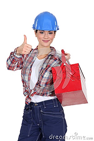 Tradeswoman holding a toolbox Stock Photo