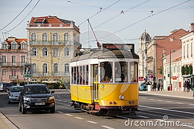 Tradidional yellow Tram in Belem street. Lisbon. Portugal Editorial Stock Photo