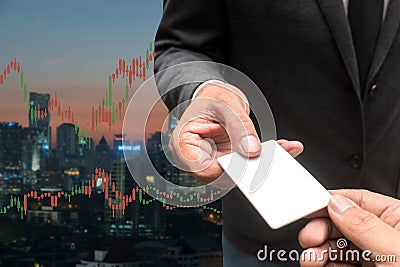 Trading Businessman hold blank credit card.and Forex Trading Lin Stock Photo