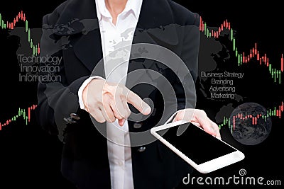 Trading Businessman hold smart phone.and Forex Trading Line Graphs Stock Photo