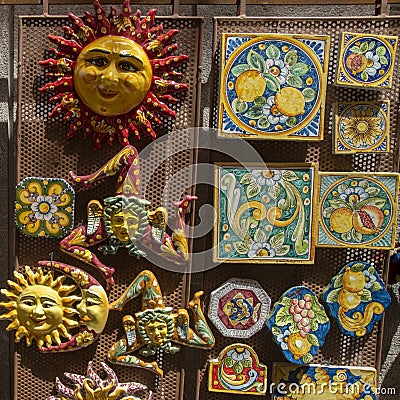 Tradioionic colorful Sicilian ceramics - sun, moon and Trinacria, Italy Stock Photo