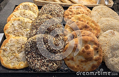 Tradition arabic bread - Pita with onions, and seeds Stock Photo