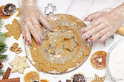 Tradition of celebrating home bakery prepares traditional holiday sweets. rolled gingerbread dough. on the background of gingerbre Stock Photo