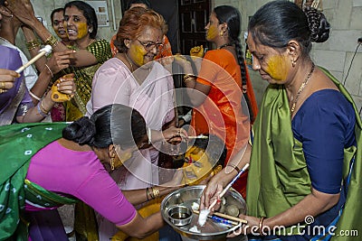 Tradition Groom Pre Wedding rituals haldi or Pithi applying turmeric Santacruz east Mumbai Editorial Stock Photo