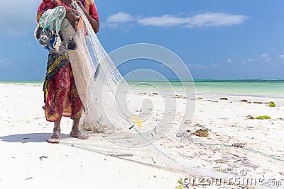 Traditional african local rural fishing on Paje beach, Zanzibar, Tanzania. Editorial Stock Photo