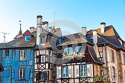 Traditional Alsatian half-timbered houses and river Lauch in Petite Venise or little Venice, old town of Colmar, decorated and Editorial Stock Photo