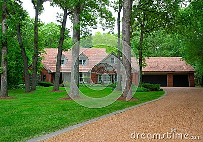 Traditional American Residential House in Woodeds Stock Photo