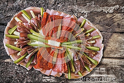 Traditional Appetizer Savory Garnished Dish Set On Old Weathered Cracked Wooden Picnic Table Grunge Surface Stock Photo