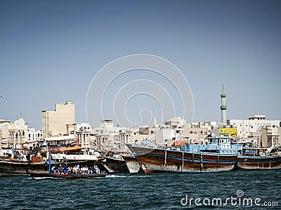 Traditional arabian dhow boats in deira harbour of dubai UAE Editorial Stock Photo