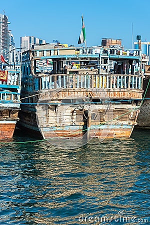 Traditional arabic cargo boats at Dubai creek, UAE Editorial Stock Photo