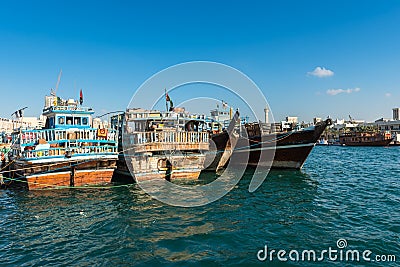 Traditional arabic cargo boats at Dubai creek, UAE Editorial Stock Photo