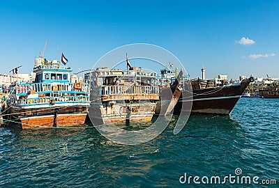 Traditional arabic cargo boats at Dubai creek, UAE Editorial Stock Photo