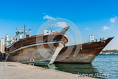 Traditional arabic cargo boats at Dubai creek, UAE Editorial Stock Photo