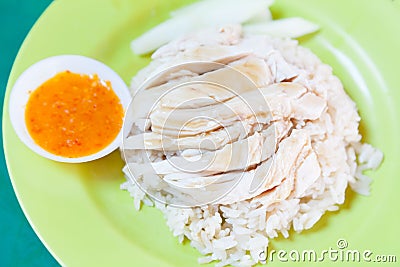 Traditional Asian Chinese Street Food: Khao Man Kai Kao Man Gai is Hainanese chicken rice, steamed chicken meat and white rice. Stock Photo