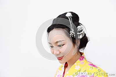 Traditional Asian Japanese woman with kimono on isolated white background Stock Photo