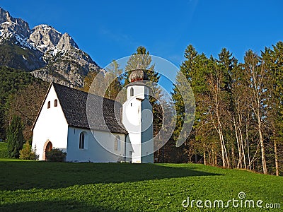 Traditional Austrian church in mountain environment Editorial Stock Photo