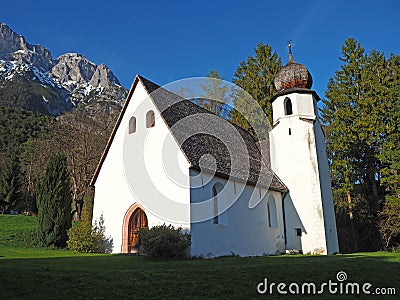 Traditional Austrian church in mountain environment Editorial Stock Photo