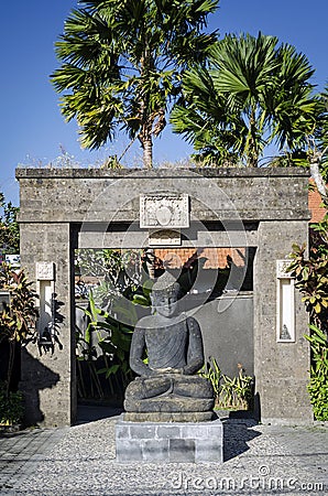 Traditional balinese stone buddha statue in bali indonesia Editorial Stock Photo